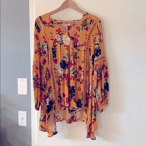 Mustard yellow top with cut out details